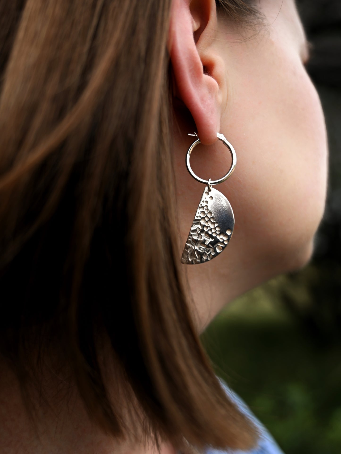 Halfmoon disc hoops side view on model